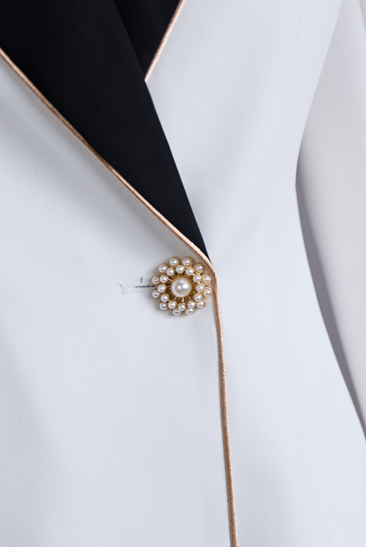 Kaenisse - Elegant White Asymmetric Blazer with Black Lapels